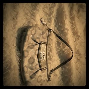 GENUINE COACH wristlet.